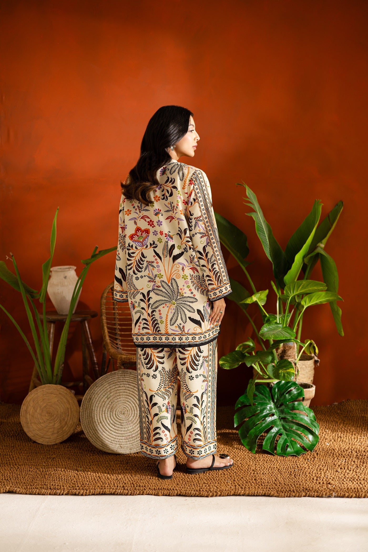 Bollywood Actress in a patterned Printed Co-ord set outfit standing and poses for photoshoot for ecommerce website