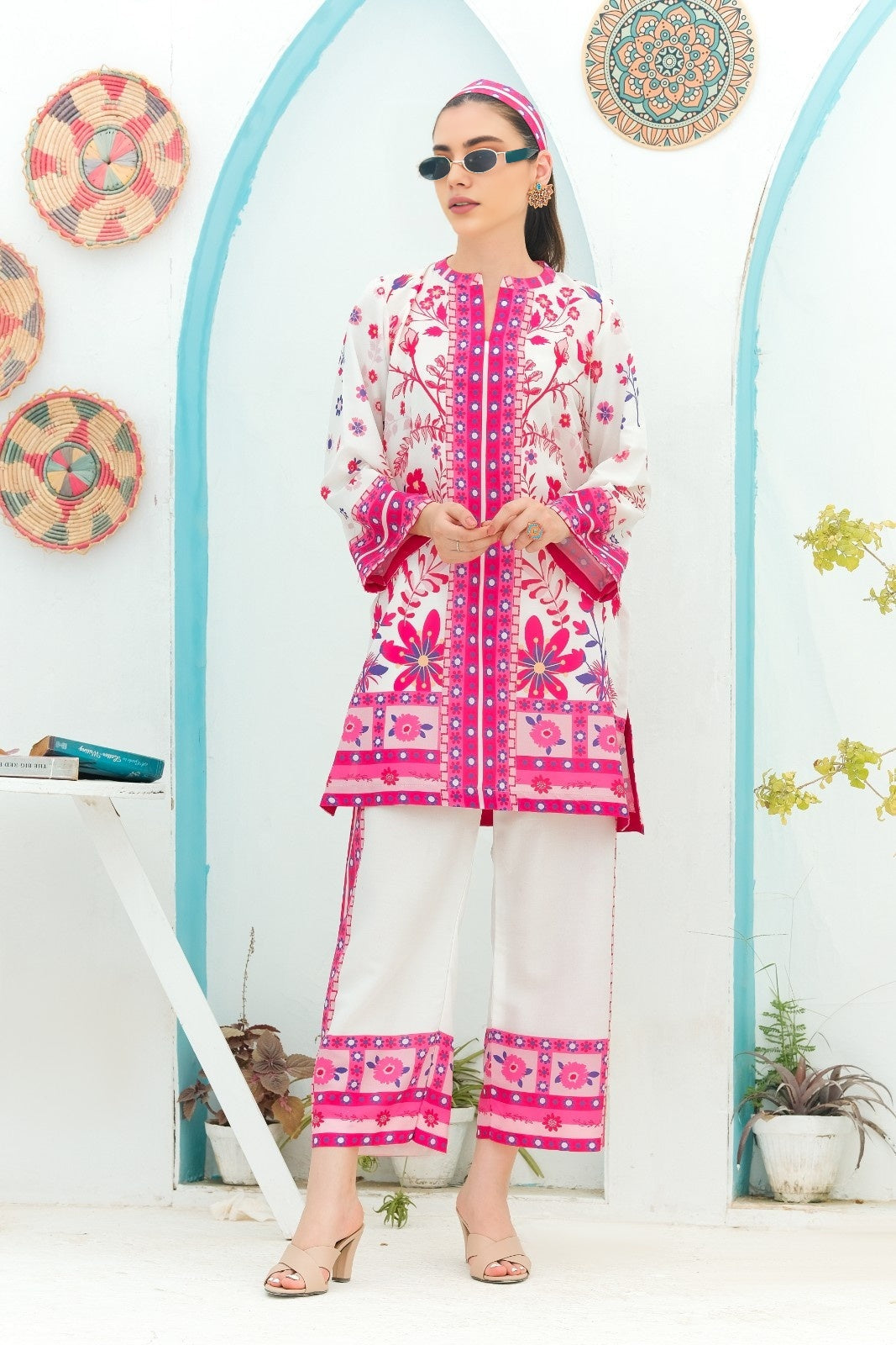 Woman wearing a pink and white Printed Co-ord set