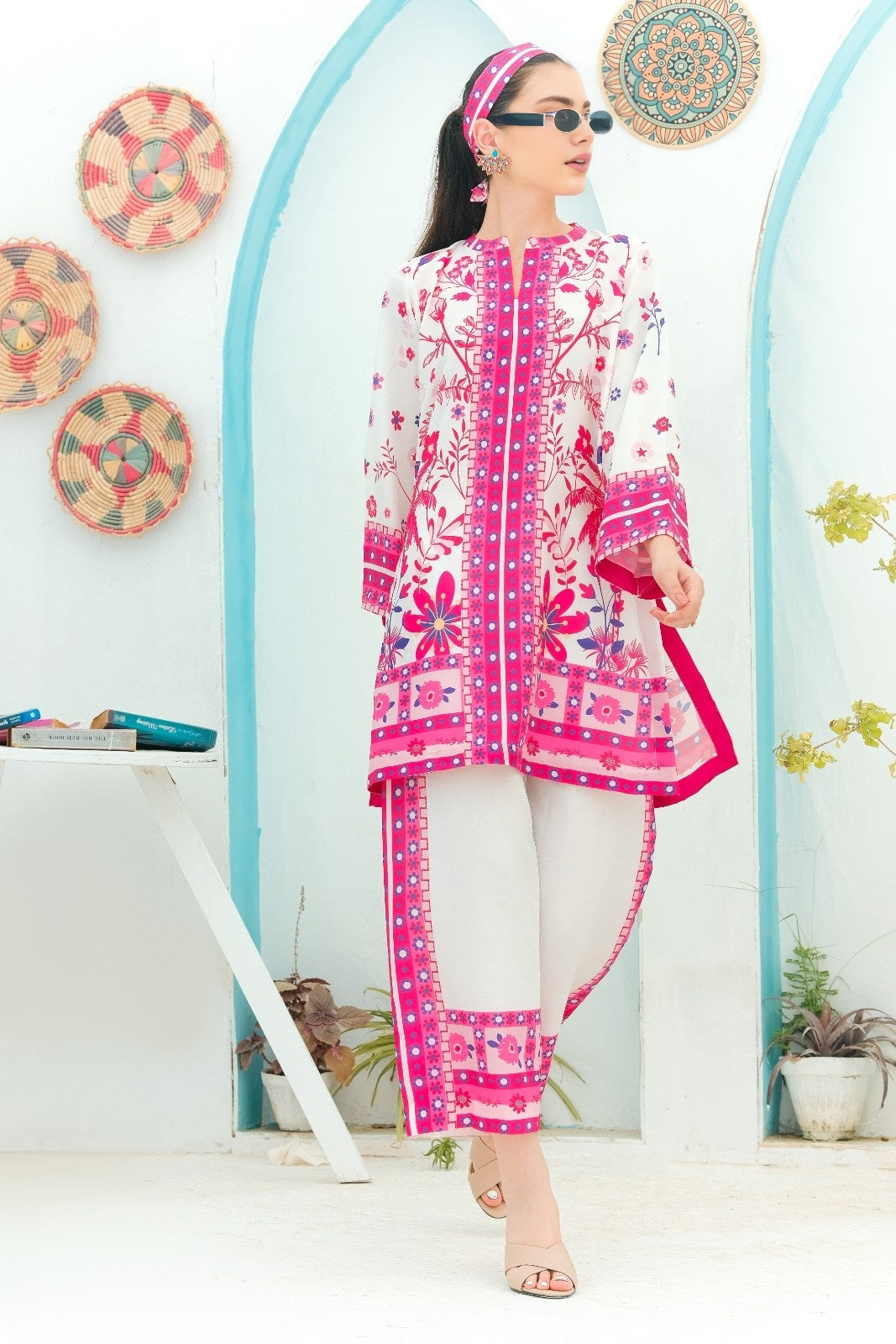Woman wearing a pink and white Printed Co-ord set