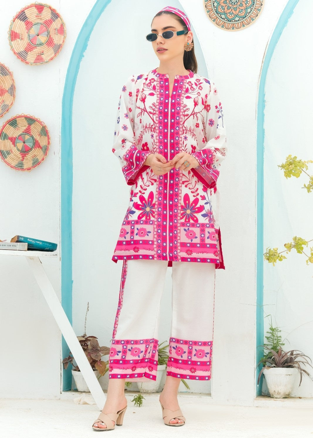 Woman wearing a pink and white Printed Co-ord set
